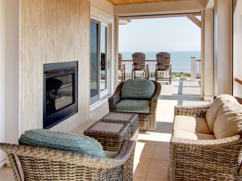 homesbysaga's tweet photo. Here on the OBX, we think it's important to incorporate areas that brings the outside in- and the inside out! Covered patios with fireplaces and TVs are the perfect way to spend our upcoming spring days https://t.co/gtR7LQgt4b