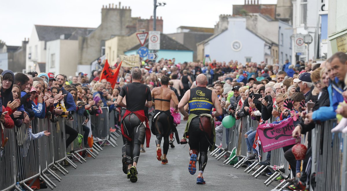 IRONMAN_Wales's tweet photo. For one day a year, there's magic in these streets. 🏴󠁧󠁢󠁷󠁬󠁳󠁿  https://t.co/ryVmnUVftZ https://t.co/NGkqX6FSR4