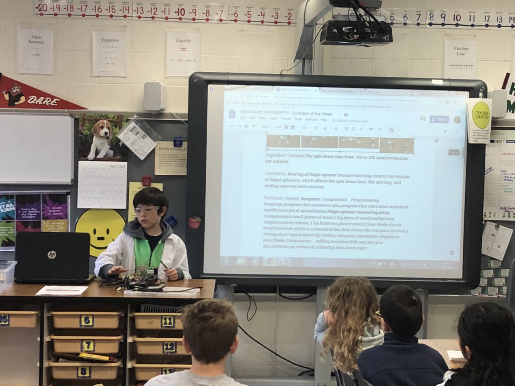 MillRunLCPS's tweet photo. This scientist of the week asks and responds to this question... What factors affect spin down time of fidget spinners?  You may need to zoom in to see the impressive robotics he created to answer his question. #mres18 https://t.co/r59TkkwnJE