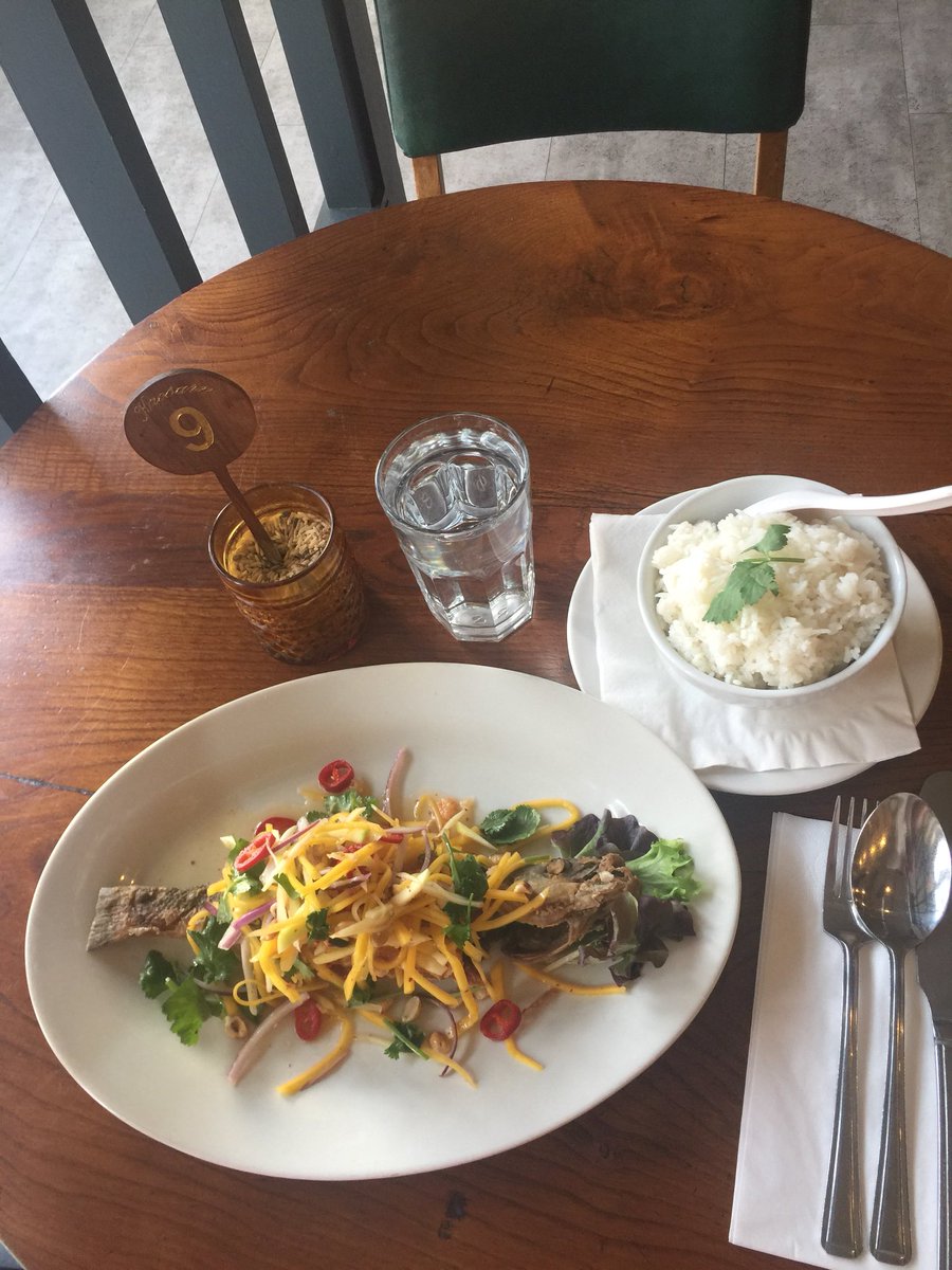 Fried sea bass with spicy fresh mango salad served with coconut rice!!