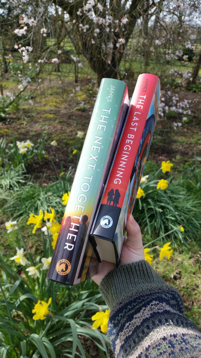 wren__james's tweet photo. The sun is out and the spring flowers are blooming so I couldn't resist taking some pics of my duology in the new hardback editions. I wish daffodils and blossoms stayed forever. 🌼🌻 #thenexttogether #thelastbeginning @skyponypress https://t.co/12UGM3nAYT