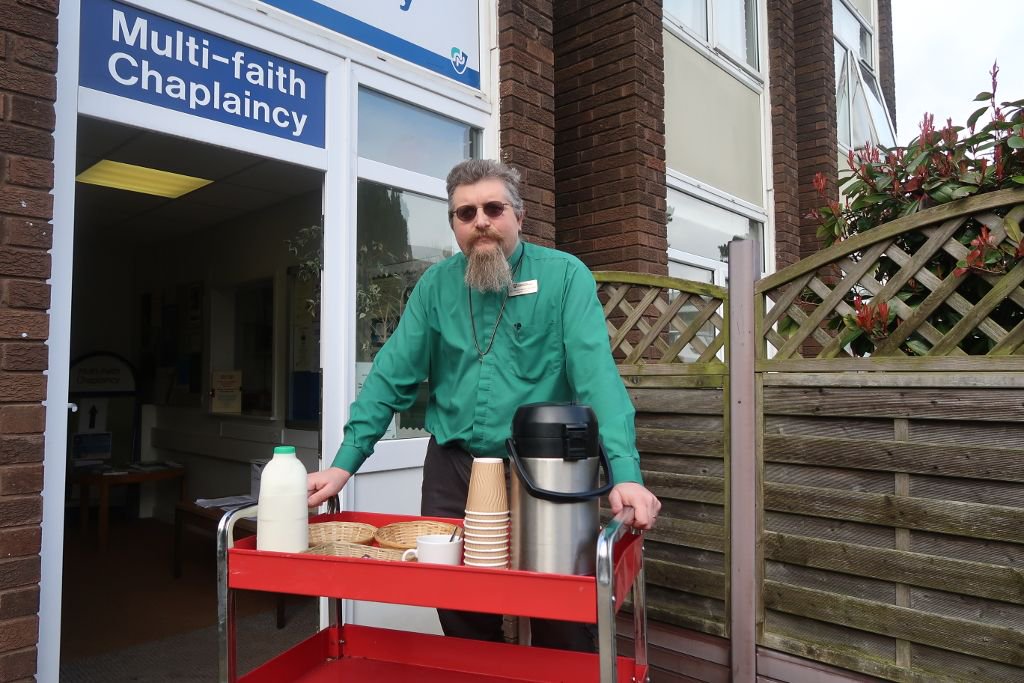 UniNorthants's tweet photo. Our #UoNHero this week is Stuart, the amazing University Chaplain from the Multi-Faith Chaplaincy Centre. You may recognise Stuart from his tea and coffee trolley, which can be seen around both campuses offering free hot drinks! #TeaHero https://t.co/TfQaAzlT6T https://t.co/KGpjfCuqCv