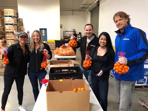 TrueCommerce's tweet photo. 5 employees from our Carlsbad office volunteered yesterday at the San Diego Food Bank. Spending all morning sorting through orange mandarins and bagging them! The Food Bank supplies food to over 1700 kids every Friday so they have something to eat on the weekends! #AWEcommittee🍊 https://t.co/hTP2z2rOyi