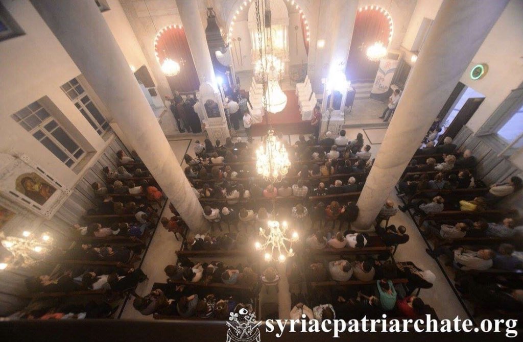 iraqschristians's tweet photo. In spite of facing constant mortars from terrorists in #EasternGhouta, #Syriac #Christians celebrate mass during Orthodox #Easter weekend at St. George Cathedral in Bab Touma, #Syria. Bab Touma means Gate of St. Thomas, who traveled thru the area on his way to India. #GoodFriday https://t.co/DHthycBhq3