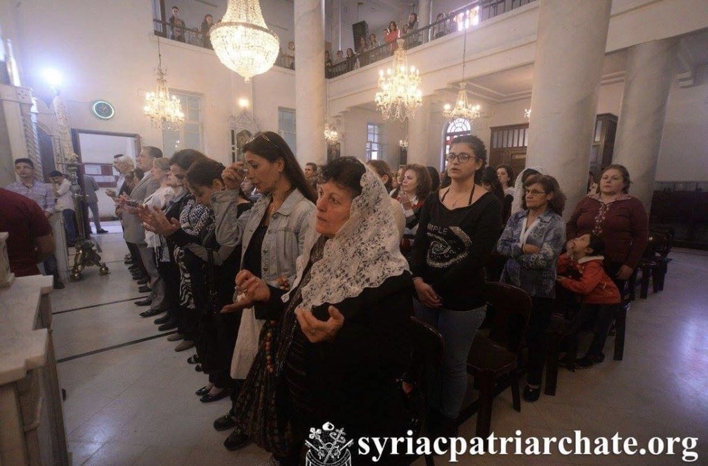 iraqschristians's tweet photo. In spite of facing constant mortars from terrorists in #EasternGhouta, #Syriac #Christians celebrate mass during Orthodox #Easter weekend at St. George Cathedral in Bab Touma, #Syria. Bab Touma means Gate of St. Thomas, who traveled thru the area on his way to India. #GoodFriday https://t.co/DHthycBhq3