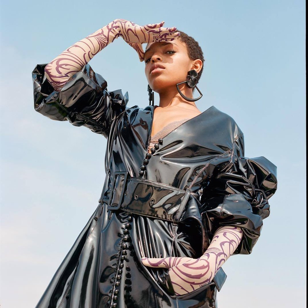 Looking for summer like... 🌞 #SelahMarley caught gazing beyond the horizon in PVC and patterned evening gloves styled by #DanasiaSutton. 📷 by #RenellMedrano #MBFW #MercedesBenzFashion