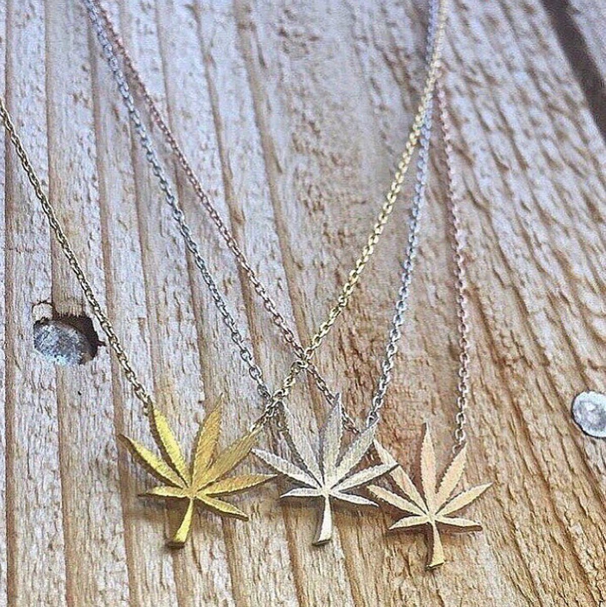 Accessorize any outfit with our #potleaf necklaces!🍁✨ Available in gold, silver, &amp; rose gold on MMJco.com!
#missmaryjane #missmaryjanegirls #missmaryjaneco #mmjco #weedleafnecklaces