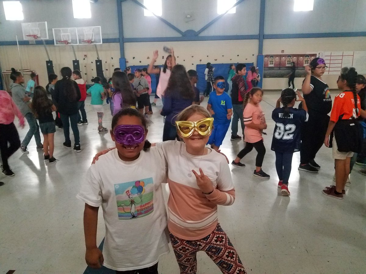 banda_sv's tweet photo. Celebrating perfect attendance at Sam H. with a masquerade dance. Can you guess who? https://t.co/ZizLxVq5A6