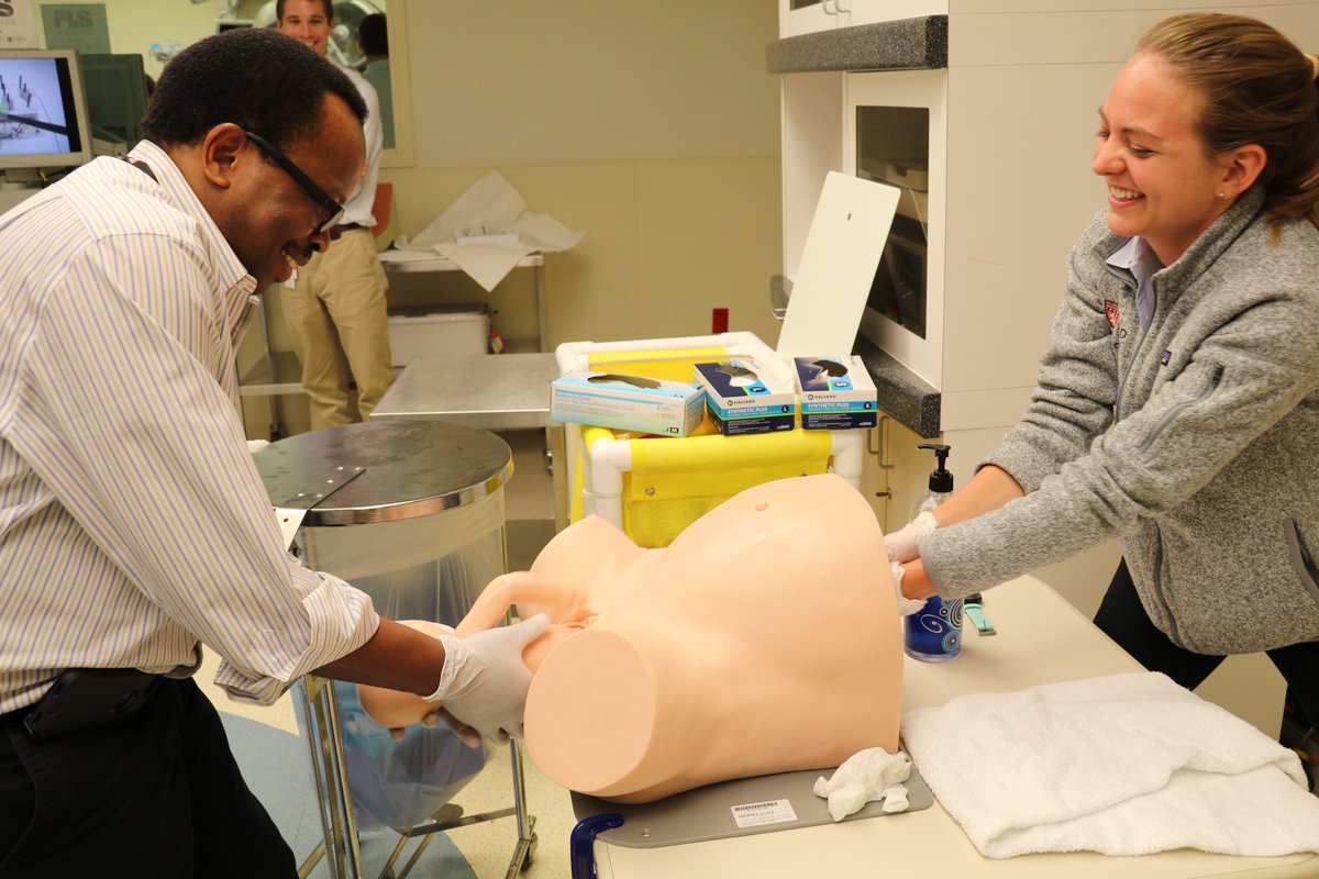 kmeratkins's tweet photo. I love it when students come and co-teach.  Wonderful #studentasteacher moment Eve Roth and Gregory Peters both #HMS students helping to show faculty our sim center in last night's #HMSMedEd18 Beyond the Mannequin session.  Eve is showing faculty our shoulder dystocia sim. https://t.co/bZKFoxB7iz
