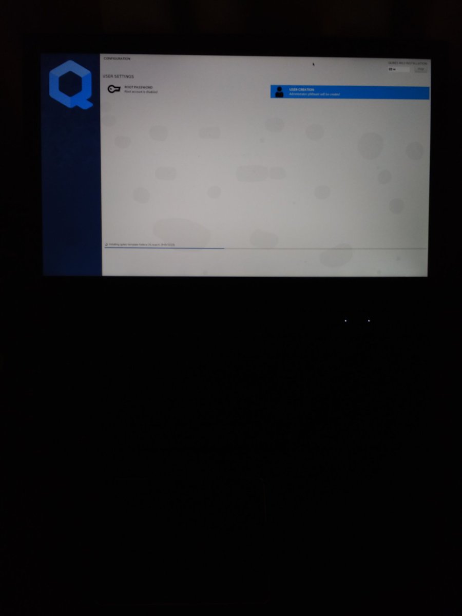 flaxandteal's tweet image. #QubesOS installer eerily floating in the darkness on a pitch-black aluminium #librem - a sense of isolation...