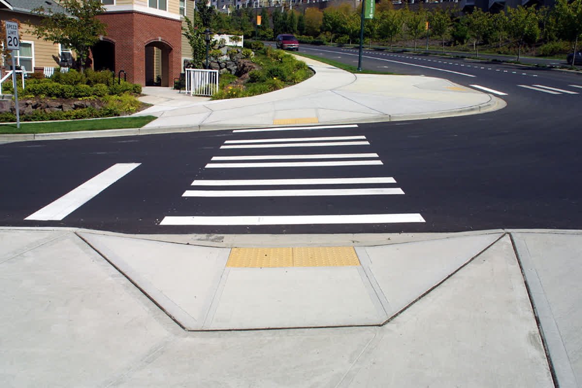 AccessAdvocates's tweet photo. #ADAfact: Newly constructed or altered street level pedestrian walkways must contain curb ramps or other sloped areas at intersections to streets, roads, or highways. https://t.co/btagMrlTIb