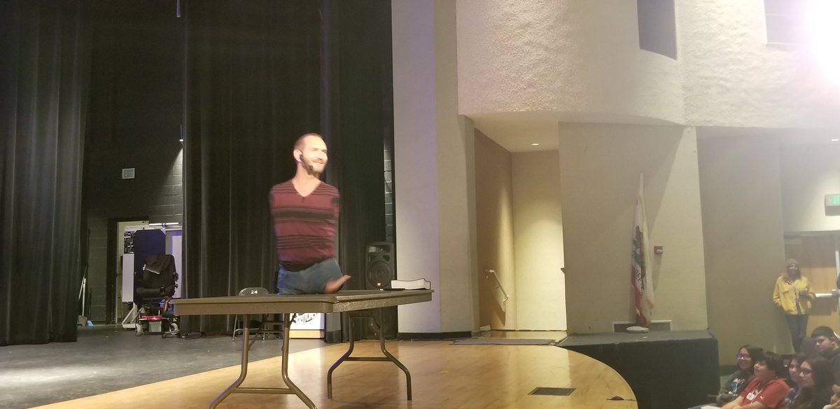 PHS Tritons stand and pledge to 'Love themselves, believe in themselves, and never give up.' Nick Vujicic was powerful today! #lifewithoutlimbs #attitudeisaltitude @OUHSD @pacificatritons @phs_tritons