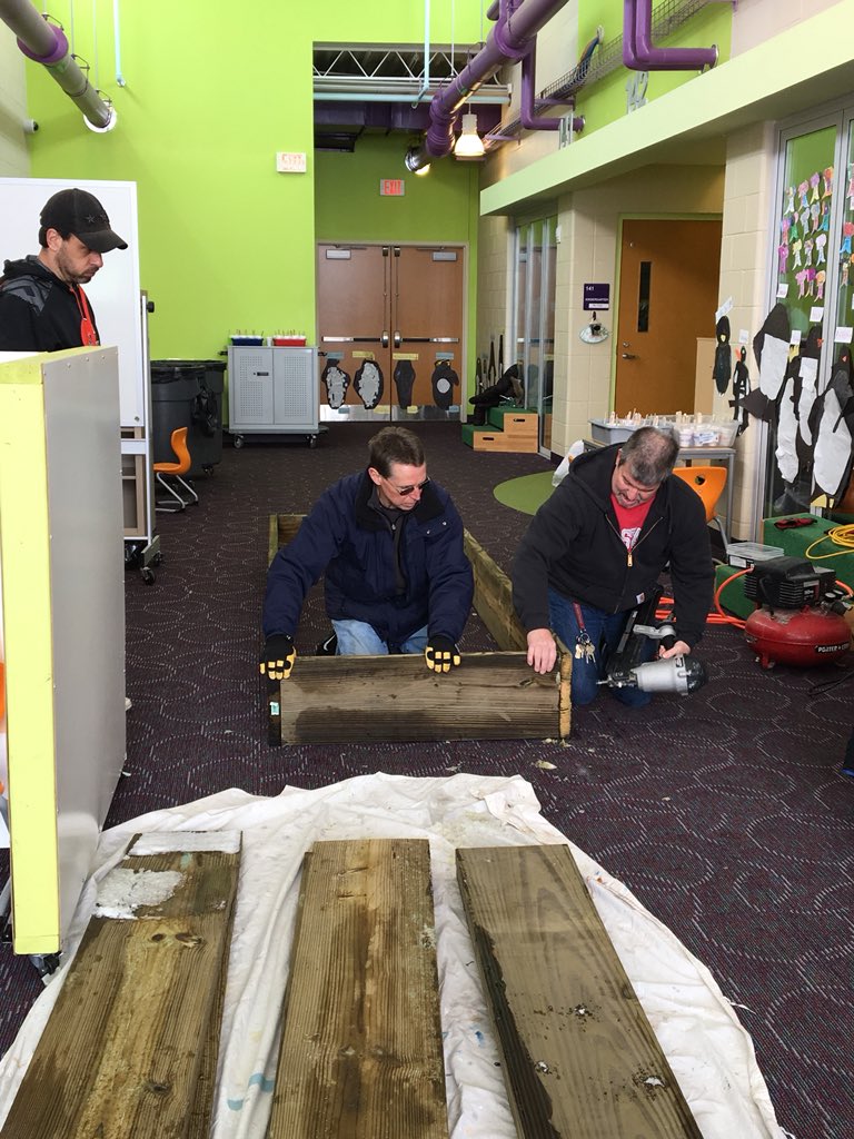 lgaughenbaugh's tweet photo. Even the snow won’t stop us from building our raised beds @Summit STEM. #reynproud https://t.co/2cvLx7IbEu