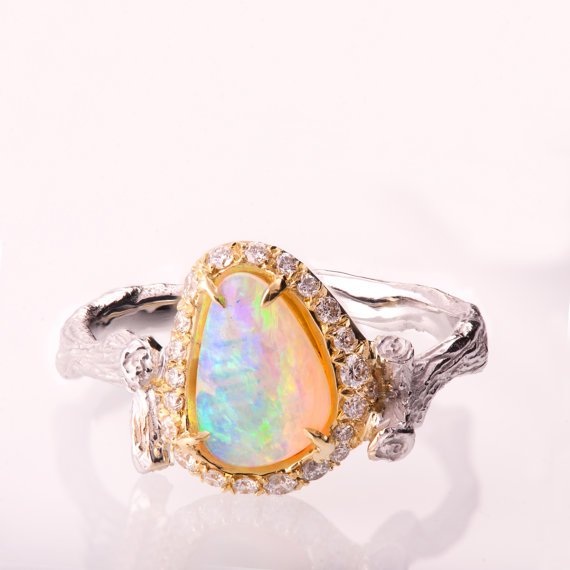 Twig Opal Engagement Ring unusualengagementringsreview.com #unusual #unique #wood #wooden #twig #opal #diamonds #diamond #engagementring #engagement #ring #weddingring #wedding #peace #love #faith #family #unity #women #woman #color #colorful #mixed #mix #mixmatch #newstyle #new #style