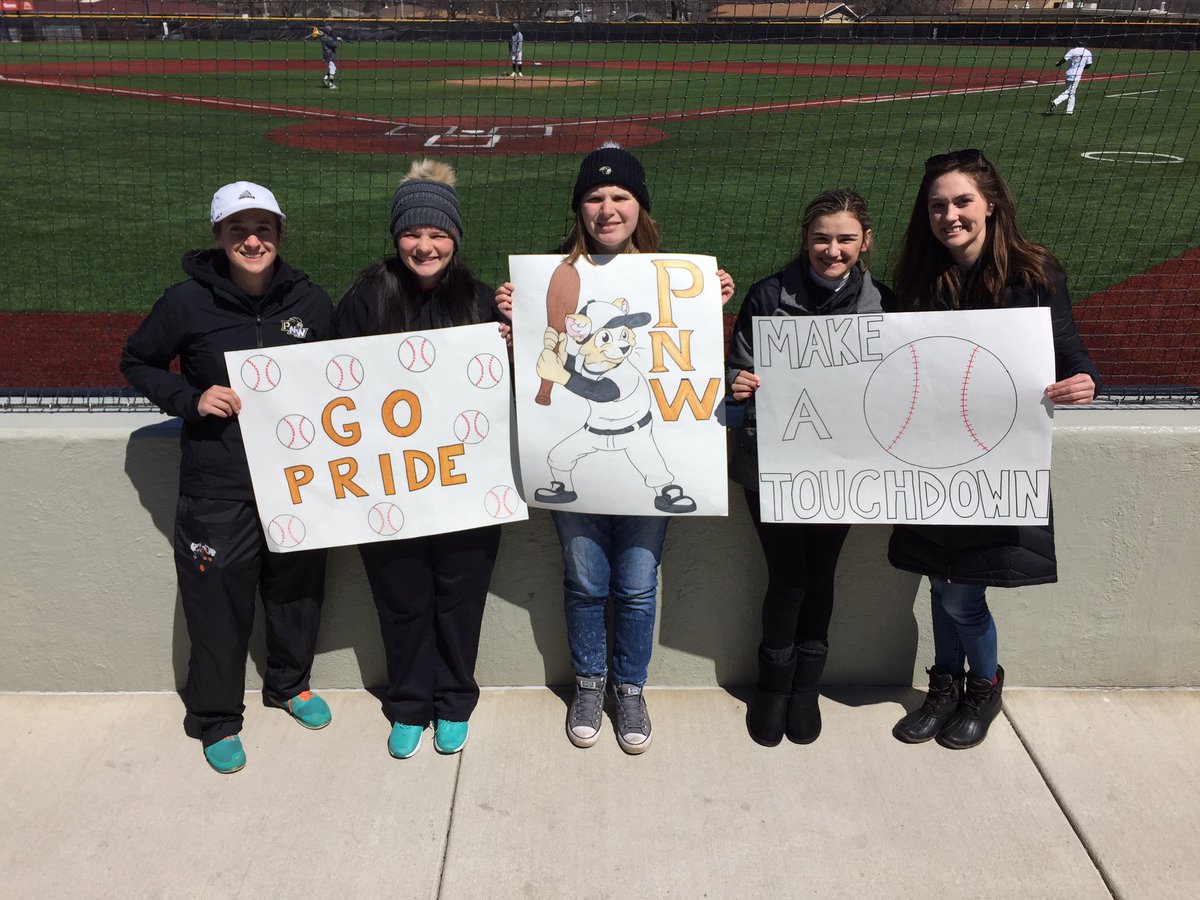 PNWathletics's tweet photo. The @PNW_MWgolf women's golf team bringing good vibes to the @PNW_Baseball team during its 5-0 win over Wayne State in game 1! #RoarPride https://t.co/HKfiY1sThp