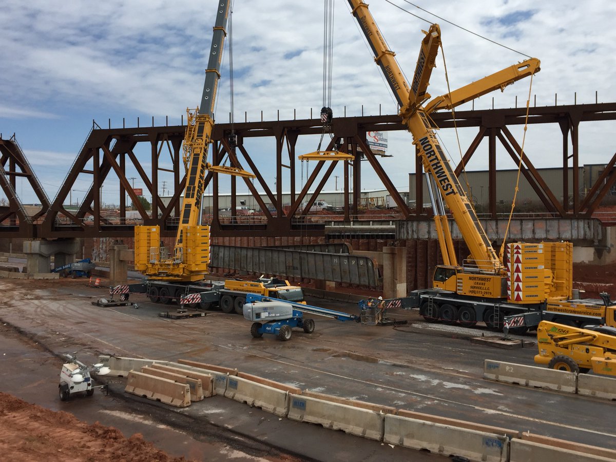 OKDOT's tweet photo. OKC- Photo of the old BNSF railroad bridge over I-235 coming down. Reminder, the interstate remains closed between N. 36th St. and I-44 through 6am Monday. #OffBroadway https://t.co/5OkutO4eRw
