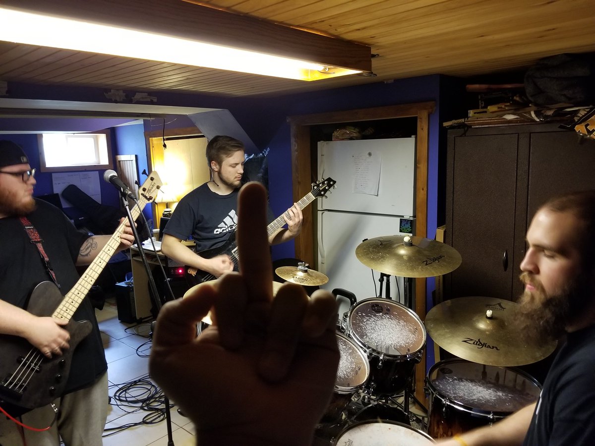 The whole crew jamming out as we remain trapped in this dungeon! Practicing for the remainder of our tour dates. If practice makes perfect and metal breeds chaos then think of this as perfected chaos lol #Practice #metal #heavymetal #basement #Philly #TRASH