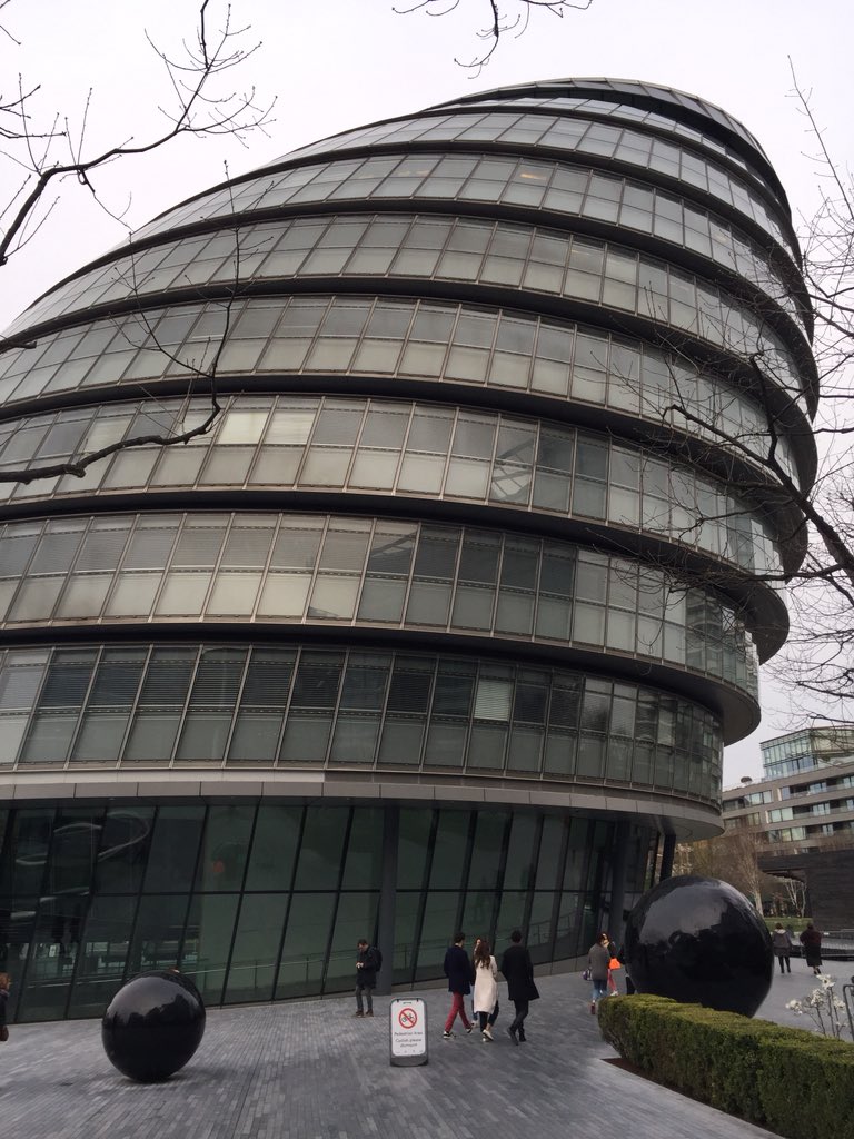 Steve_R_Price's tweet photo. Hey @MC_Kugel, I was walking past London City Hall this afternoon, and I met two distant relatives of yours!  

The English globes, turns out, are quite stationary and were very impressed when I told them about your kugel-spinning abilities. 

#MCLondon18 https://t.co/xOzDGdj2Pm