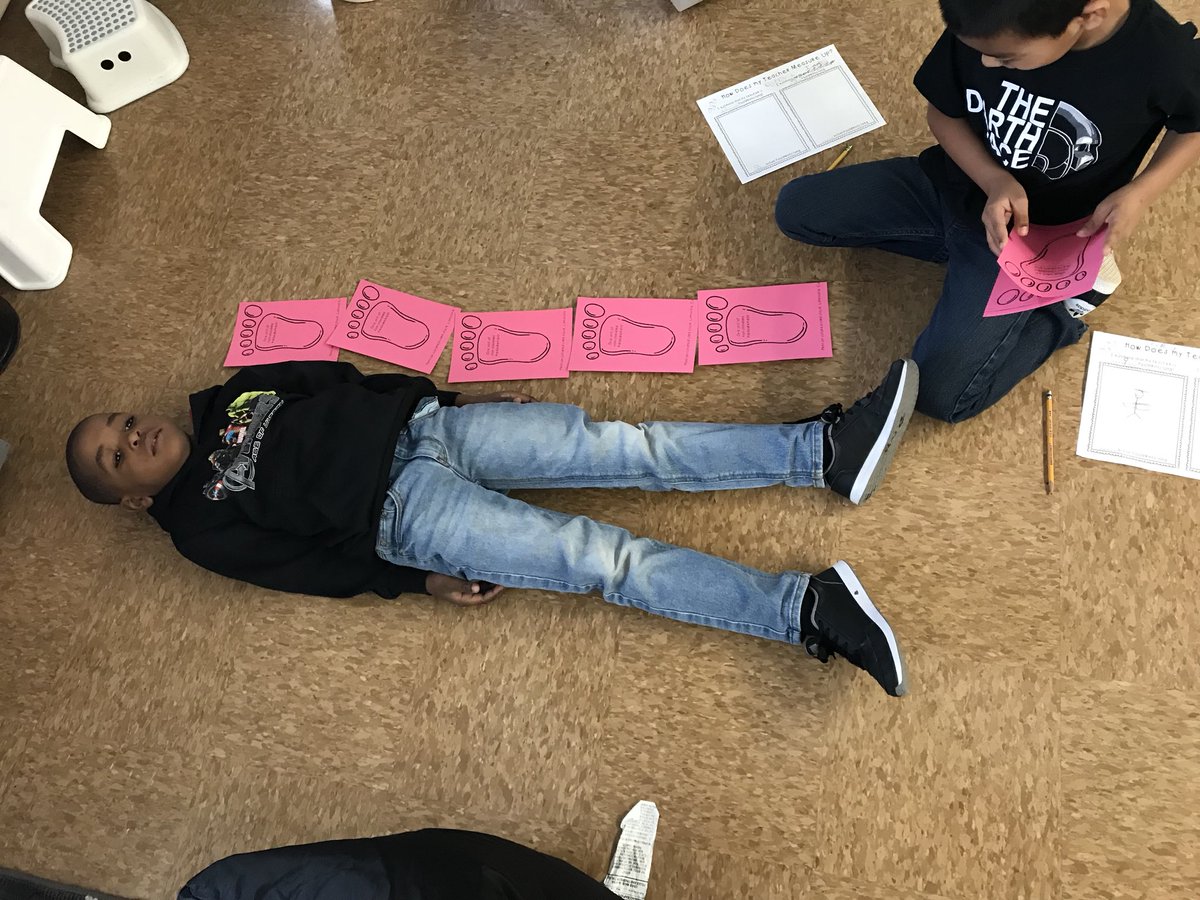 HembroughGrade1's tweet photo. In first grade, we use non-standard units to measure. For example, we can use feet cutouts to measure classmates! 👣 https://t.co/oN5DrAgRcf