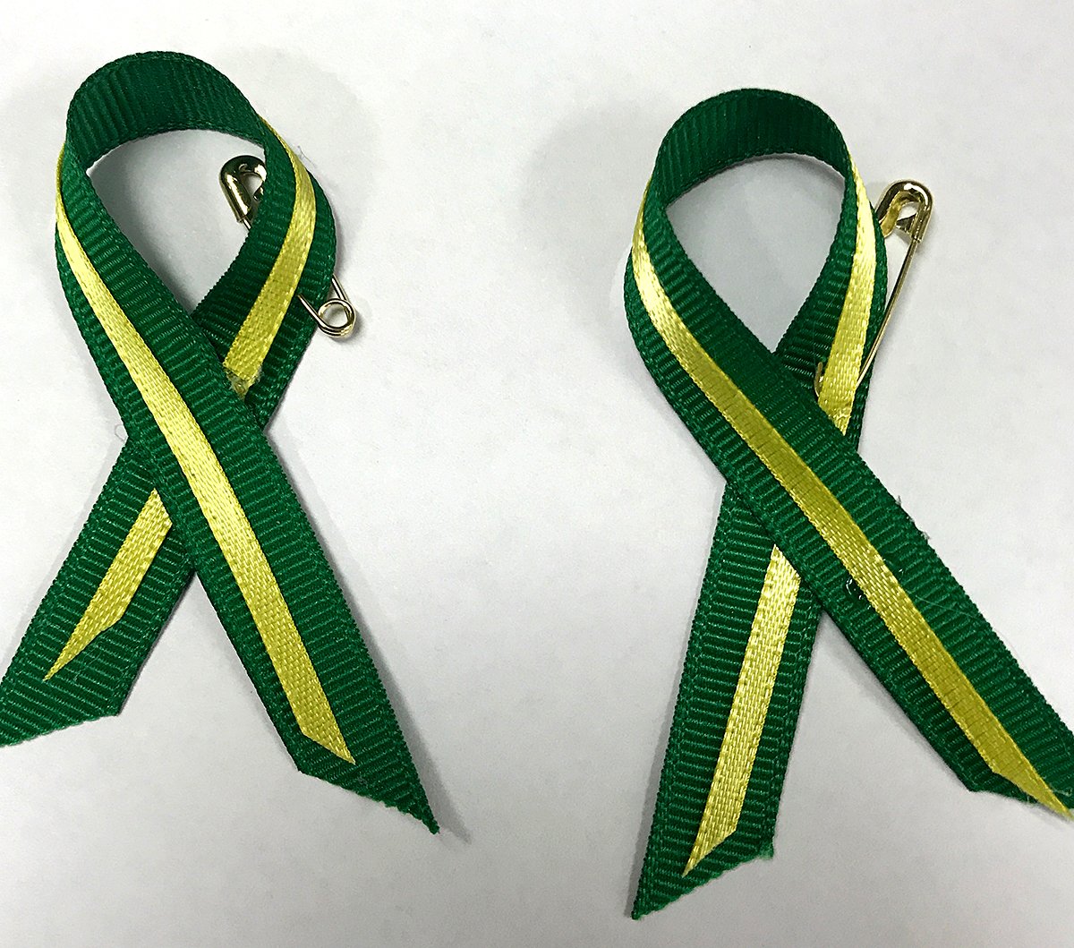 #Oilers &amp; Canucks players will have decals on their helmets for tonight's game while coaches will wear lapel ribbons. #PrayForHumboldt