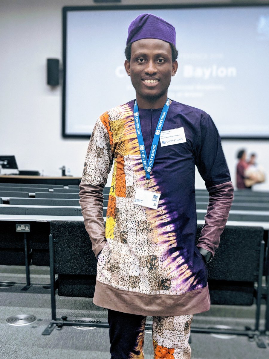 OluwamayowaTJ's tweet photo. At the #CheveningConference18, I wore a number of caps: I presented my academic work on 'How Nations Can laugh their way to Development: A critical analysis of Humour for Development'. I was proudly #Sussex, #Chevening and ultimately, #Nigerian! #IAmChevening https://t.co/wpLVrkzLDq