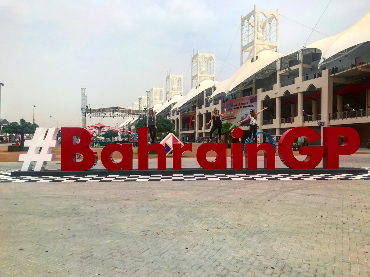 kirtb's tweet photo. My tour of the F1 signs continues. This time I’m joined by my two favorite gingers @carlyevabrown and @oliviastapes #galsontour #bahraingp #C4F1 https://t.co/VFmA3ZDDaY