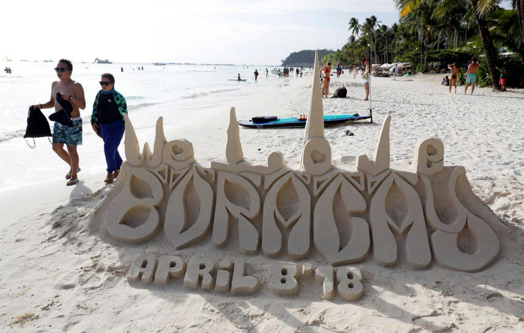 Reuters's tweet photo. Philippines' Boracay workers appeal for aid after order to close https://t.co/mfvyM4xpoo https://t.co/5i0F7nYJAV
