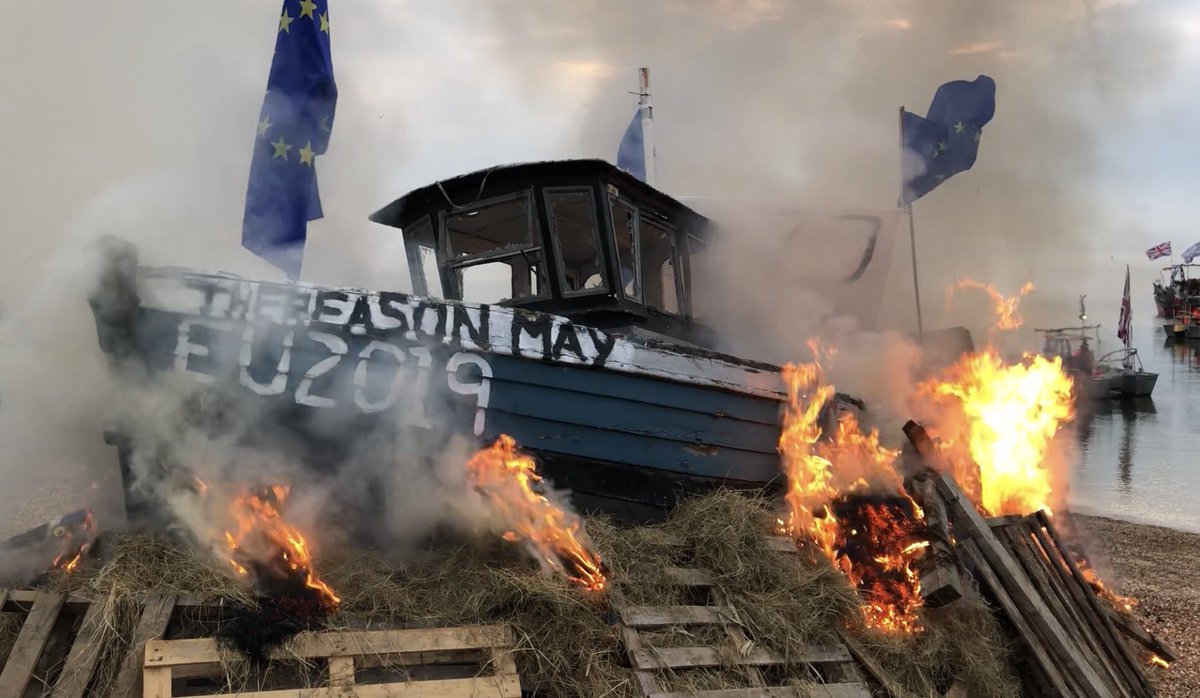 Nigel_Farage's tweet photo. British fishing industry in flames. Theresa May has betrayed our fishermen. Brexit must mean Brexit. https://t.co/5r5VdFkNux