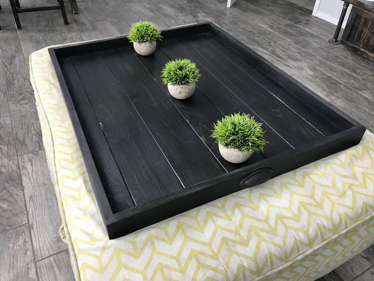 twomoosedesign's tweet photo. Pictured is a 30x36 ottoman tray finished in an ebony stain.

What do you think do you prefer dark stains or lighter stains??🤔🤔 #ottoman #servingtray #ottomantray #rusticdecor #farmhousedecor https://t.co/rLUWTMbXHj