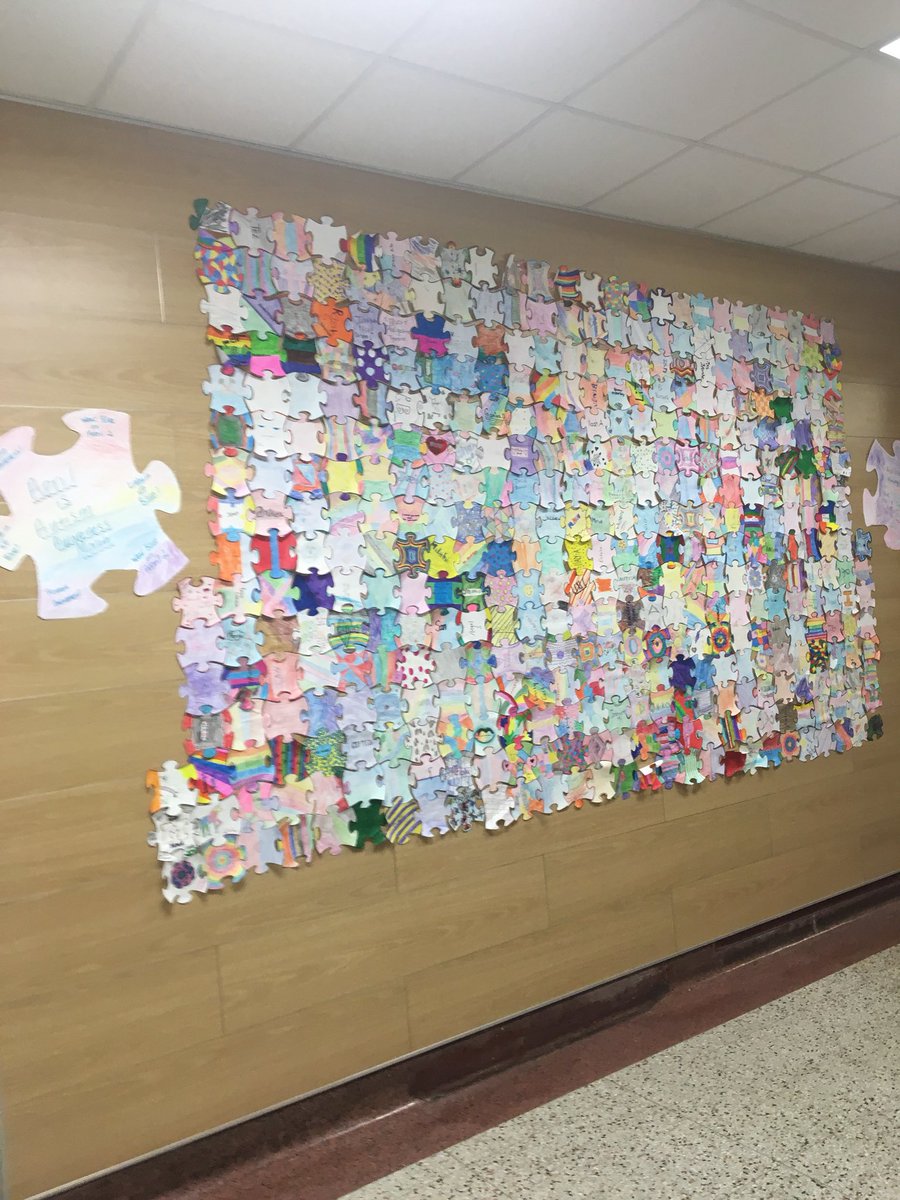 RCS_Director's tweet photo. An awesome hallway display to celebrate Autism Awarenness at JW Eater Junior High organized by Sara McElroy! https://t.co/nLTjUWr6Mh