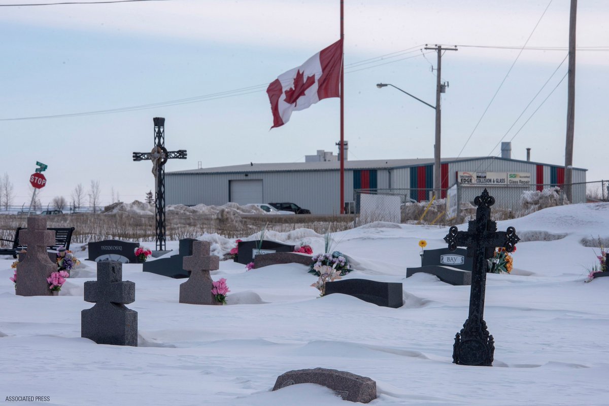 FoxNews's tweet photo. A large Canadian flag at half-mast is seen from a cemetery in #Humboldt, Saskatchewan, on Sunday, April 8, 2018. 15 people traveling with the Humboldt Broncos SJHL hockey team have died, after their bus collided with a semi-trailer on Friday. https://t.co/kpbosHhWTW https://t.co/yEPRb31iN6