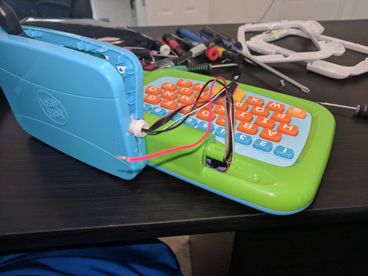iamgregskeene's tweet photo. My son is very sad his @LeapFrog convertible laptop tablet stopped working after a short period of time. Time to try and fix it. This would be easier if Leapfrog used screws instead of claps, so I can solder the power wire back to the circuit board. #techlife #childernlearn https://t.co/yqDWJzIuC6