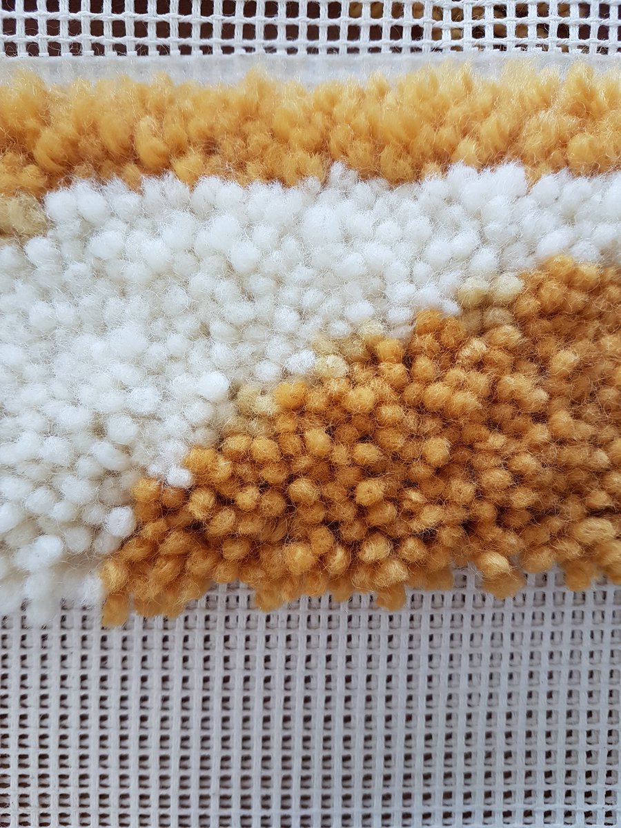 Midio on X: Experimenting latch hook tapestry weaving, it's pixel