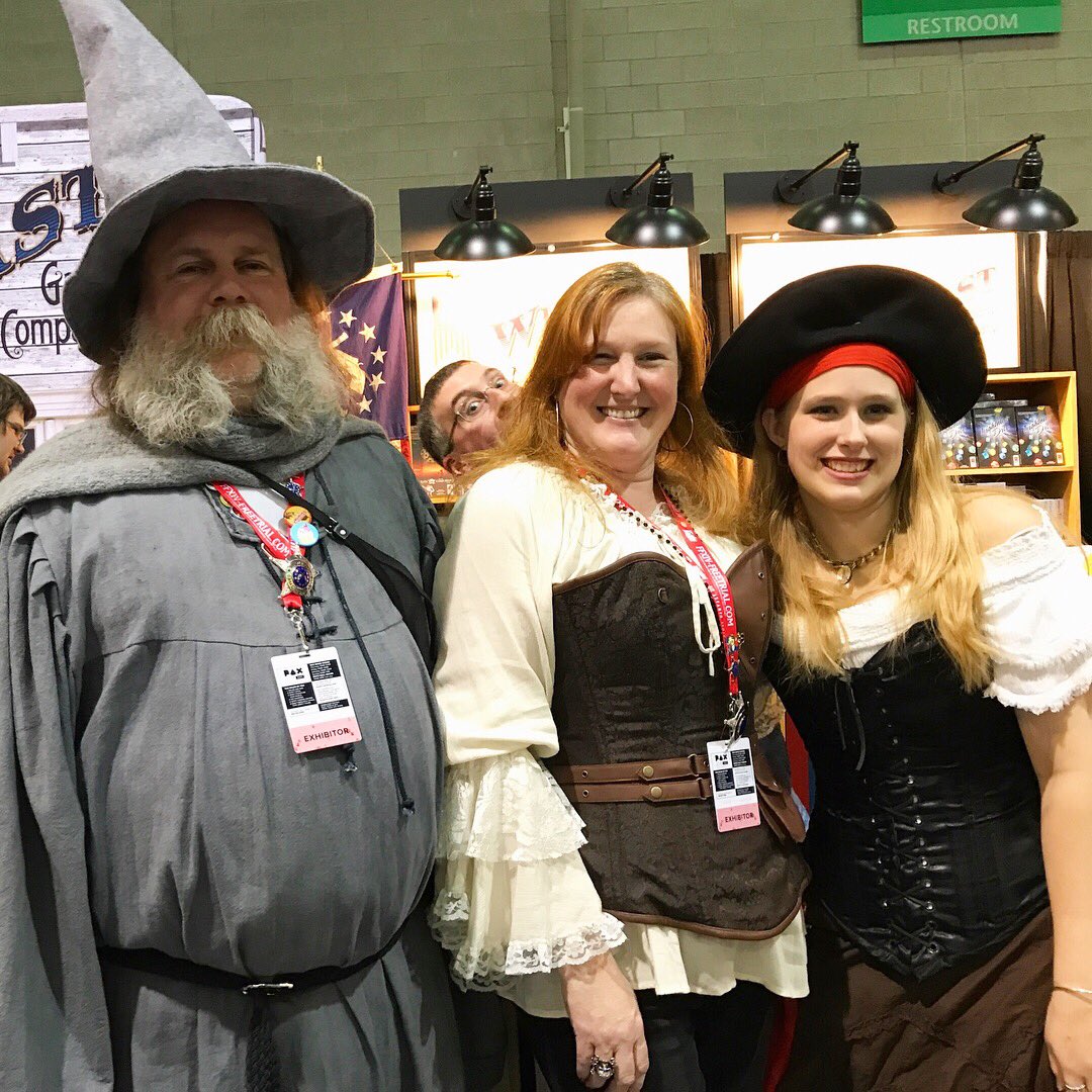 WildEastGames's tweet photo. Having fun here in booth 10100! Stop by and get Britany the Artist and Brian the creator to sign a promo card or box set! #PaxEast2018 https://t.co/WtaTvUVV6c