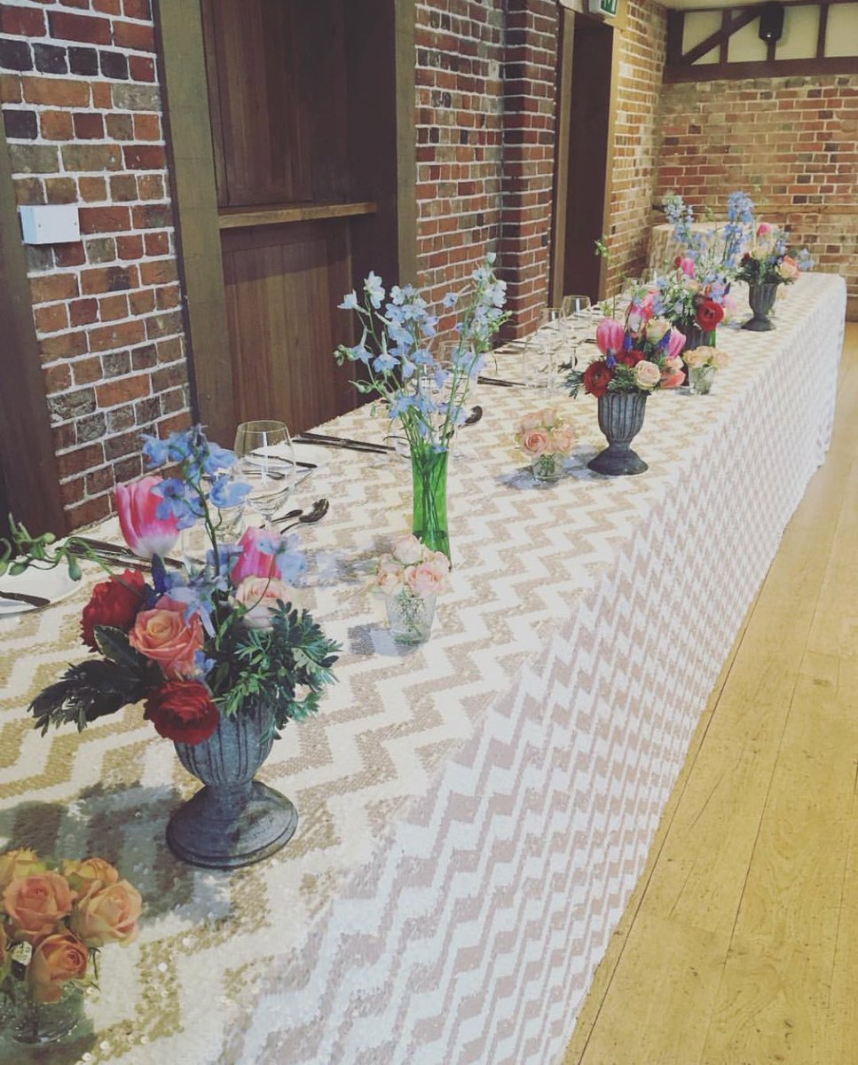FRESH AND PRETTY top table with gorgeous spring flowers by <a href="/violetandvelvet/">Sam Cotterrell</a> and chevron sequin cloth by <a href="/Medit_Occasions/">Venue Stylists</a> #weddinghour #wedding #gaynespark #barnwedding