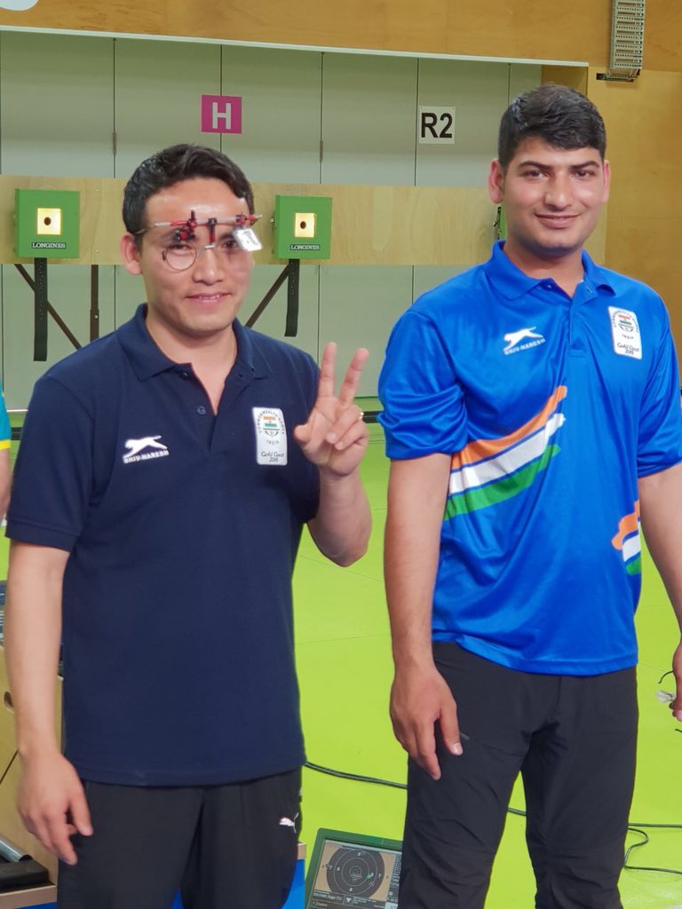 Media_SAI's tweet photo. After winning in 2014 #CWG, Jitu Rai wins his second🥇(&amp; created new GR in Final) while Om Mitharval takes home a Bronze in Men's 10m Air Pistol event #CWG2018. Watch the moments from their medal winning performance here. #IndiaAtCWG #SAI https://t.co/7t2rabzKlt