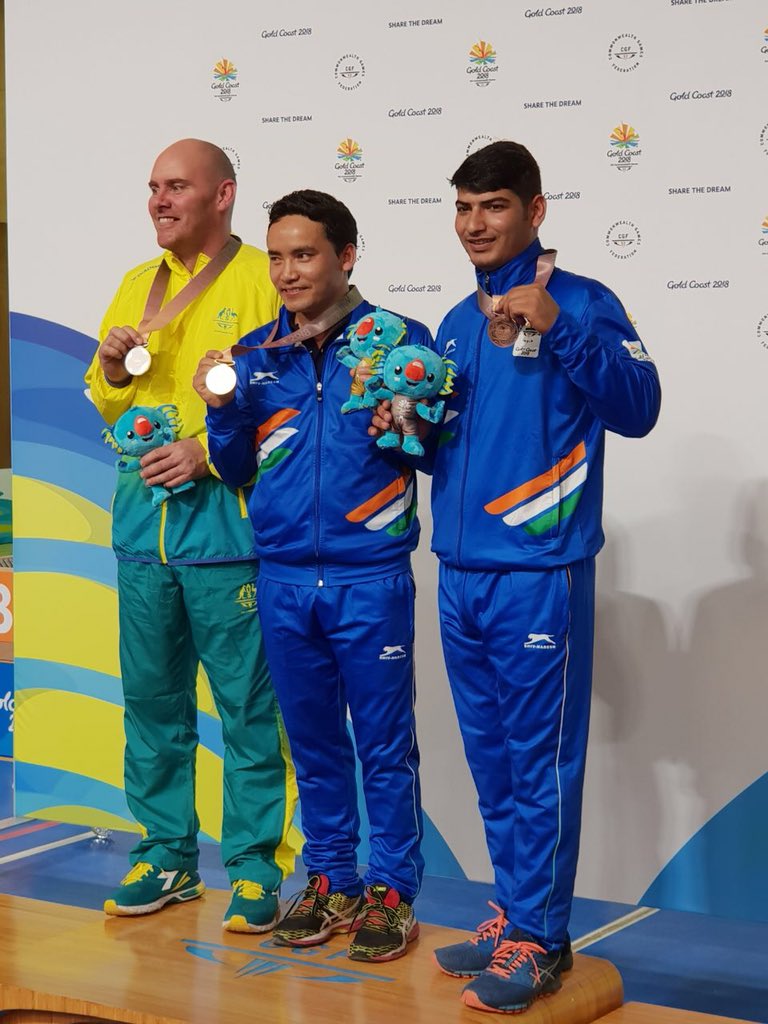 Media_SAI's tweet photo. After winning in 2014 #CWG, Jitu Rai wins his second🥇(&amp; created new GR in Final) while Om Mitharval takes home a Bronze in Men's 10m Air Pistol event #CWG2018. Watch the moments from their medal winning performance here. #IndiaAtCWG #SAI https://t.co/7t2rabzKlt