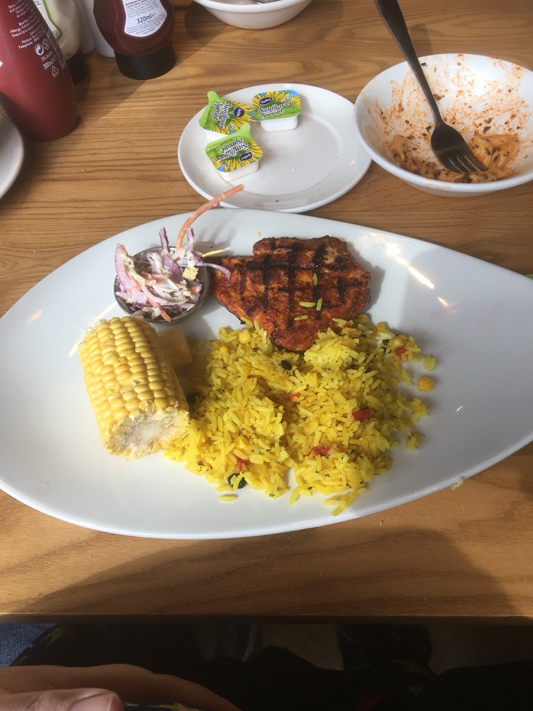 TarnyaCuff's tweet photo. @HarvesterUK cheeky charging 9.99 for what tastes like microwaved over done rice and a chicken breast I could have got for a £1. Main ingredient missing no mango sauce. totally gutted when this bare unappetising plate was put in front of me, couldn’t even try to make it look good https://t.co/9qKIJnLR6H