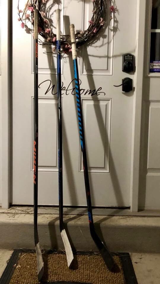 JamieRivers08's tweet photo. The boys and I put our sticks out on the porch tonight. #HumboldtStrong #Broncos https://t.co/qidZFDqHQE