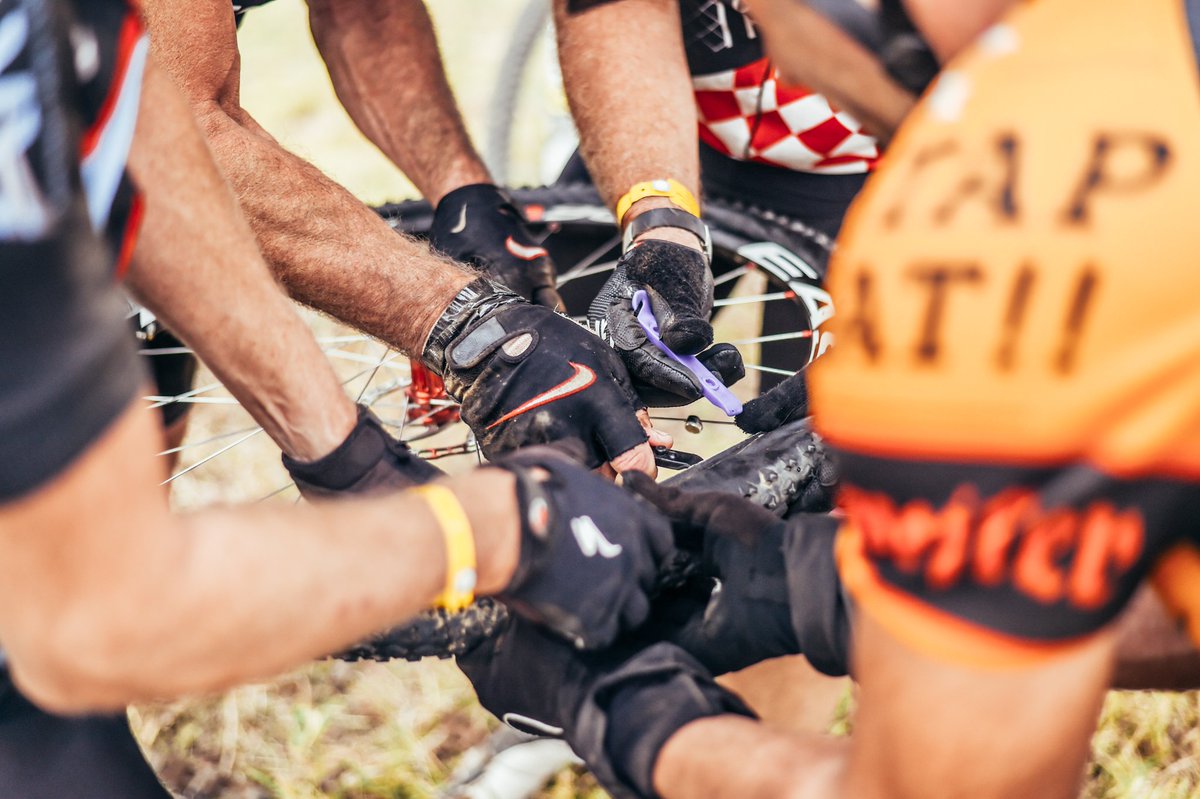 How many riders does it take to fix a puncture... Don't be a panic mechanic during the race! Make sure you are able to do basic repairs on route should it be required and make sure you have the tools for the job! #KAPsani2c #morethanaride