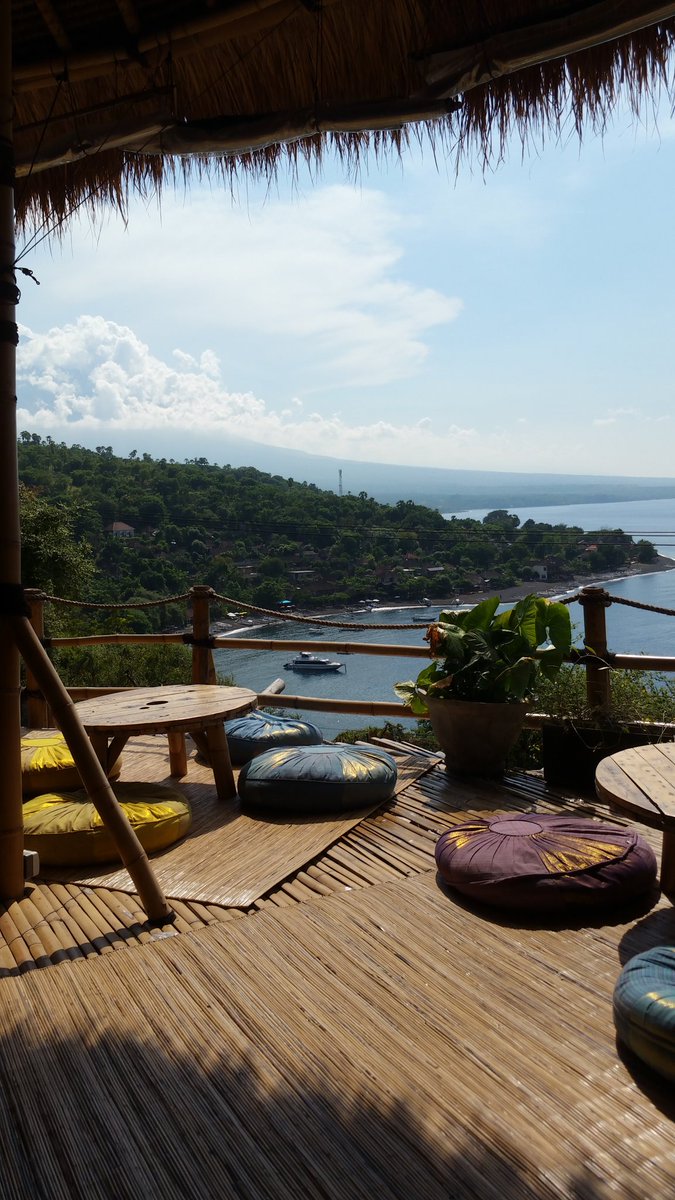 Blanca Stella Mejia Watching The Sunset From The Hilltop Of Amed In This Cool Place Called Blue Earth Village All Made Of Bamboo Amed Bali Sunset T Co Xzuywvjs5f