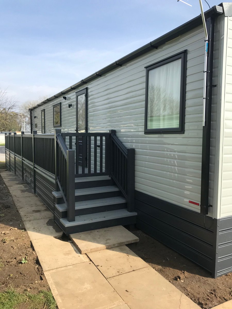 Stunning slate grey wraparound on the equally stunning <a href="/ABIHolidayHomes/">ABI Holiday Homes</a> Ambleside at #NewbusGrange. With steps to both the front and rear, and storage beneath, this gorgeous deck offers as much in functionality as is does in beauty.