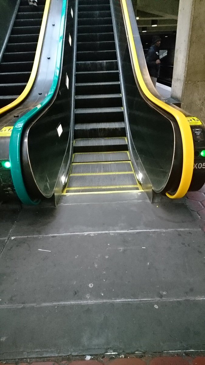 kellyperl's tweet photo. A view of the new escalator color scheme @ Fort Totten Green/Yellow platform. Would rather #wmata fix that leak over the down escalator or restore #rushplus. And THAT, Mr. @JackEvansWard2, is why we metro rail riders are "negative." Priorities! @unsuckdcmetro @FixWMATA https://t.co/WO4dtOd451