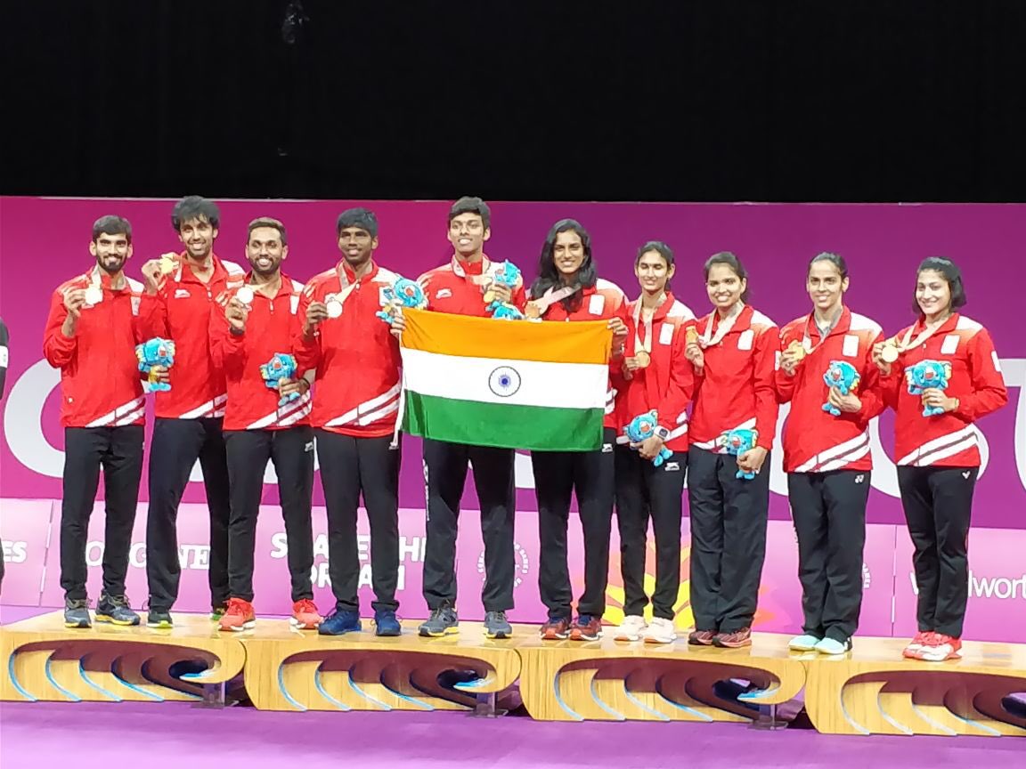 Ra_THORe's tweet photo. Bravo! India bags its first ever🥇medal in mixed team badminton match!
Great work there by the Indian team who fought it hard on the court to clinch a🥇medal.
#IndiaAtCWG #GC2018 #CWG2018 https://t.co/yMuurnoNyC