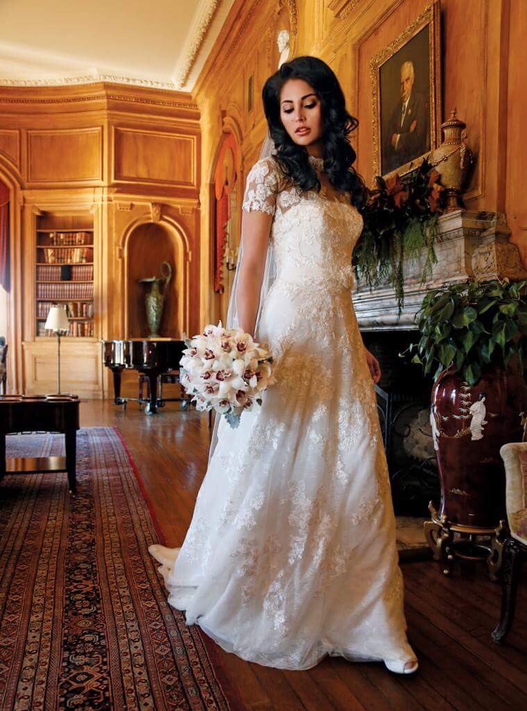 Location: <a href="/ohekacastle/">OHEKA CASTLE</a>; Model: Monica of <a href="/NewYorkModels/">New York Model Mgmt</a>; Gown: <a href="/Oleg_Cassini/">Oleg Cassini, NY</a> (CWG790); Flowers: <a href="/aristonflowers/">Ariston Flowers</a>; Haie: Cristina Mujica of <a href="/BridalSuiteNY/">The Bridal Suite NY</a>; Makeup: Makeup By Bri-Lyn LLC