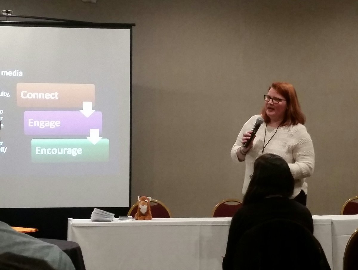 Daniel_Krull's tweet photo. Jennifer Roeszies (@CraftyChick844) with #ARCHie, speaking on using social media at the @ritarchives to engage with followers and to create new connections. @RITtigers #MANY2018 #VisioningChange https://t.co/zxie4fYMm0