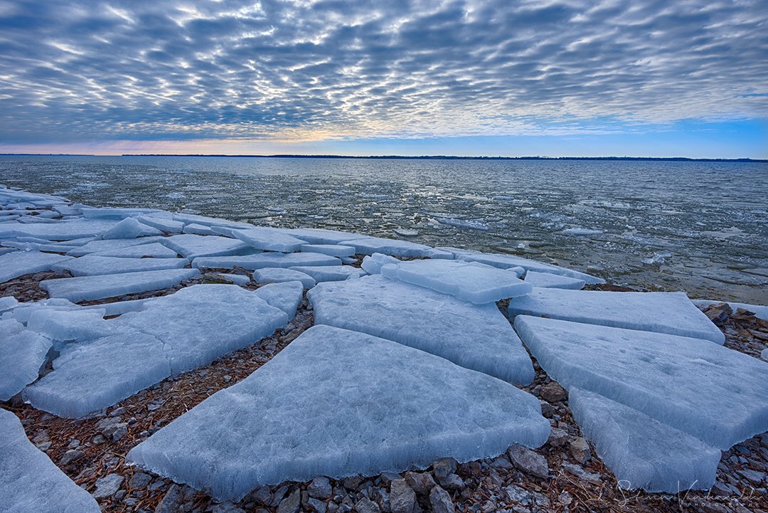 _SVphotography's tweet photo. Ice polygons on the shore of Lake Ontario in mid day competing with their lighter and softer edged counterparts in the sky.
#StormHour #ThePhotoHour https://t.co/VrBHoj46lG