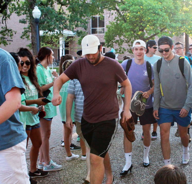 SFA is proud to host the Walk a Mile in Her Shoes march. The event is an opportunity for men to raise awareness about the causes and effects of violence against women. The march will begin at 6 p.m. tomorrow in the Baker Pattillo Student Center Plaza. Photo credit: Hannah Russell