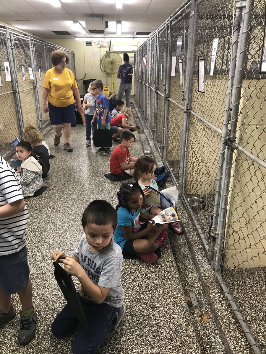 Reading to shelter dogs at the Tampa Humane Society. What a great way to end our ALU!