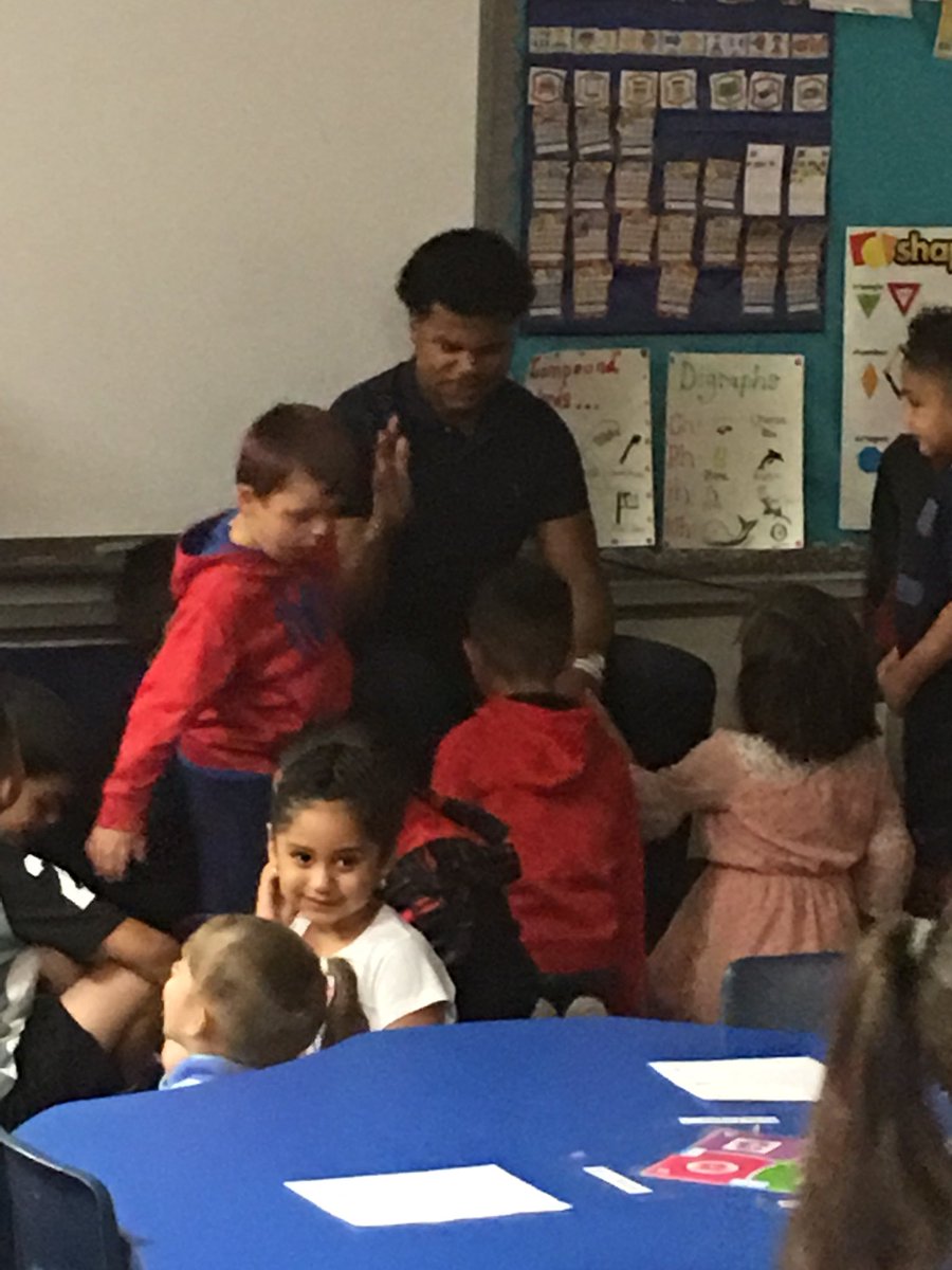 WoodReadingSpc's tweet photo. OHS football players reading to Kinder at Pease! @ECISD_T2L @PeaseECISD https://t.co/jTTQaiz2mk